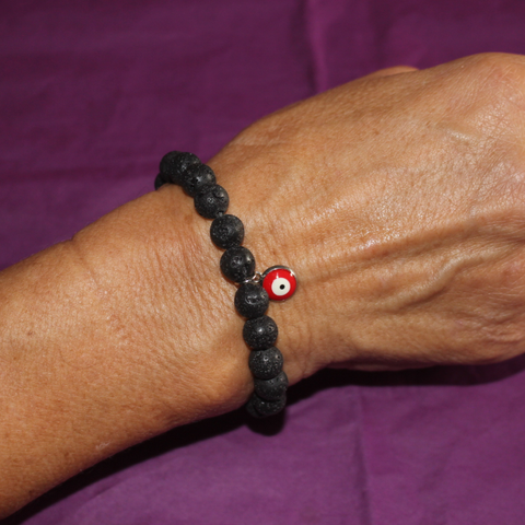 Pulsera de Piedra Volcánica negra con ojo turco (transmutación de energías negativas)