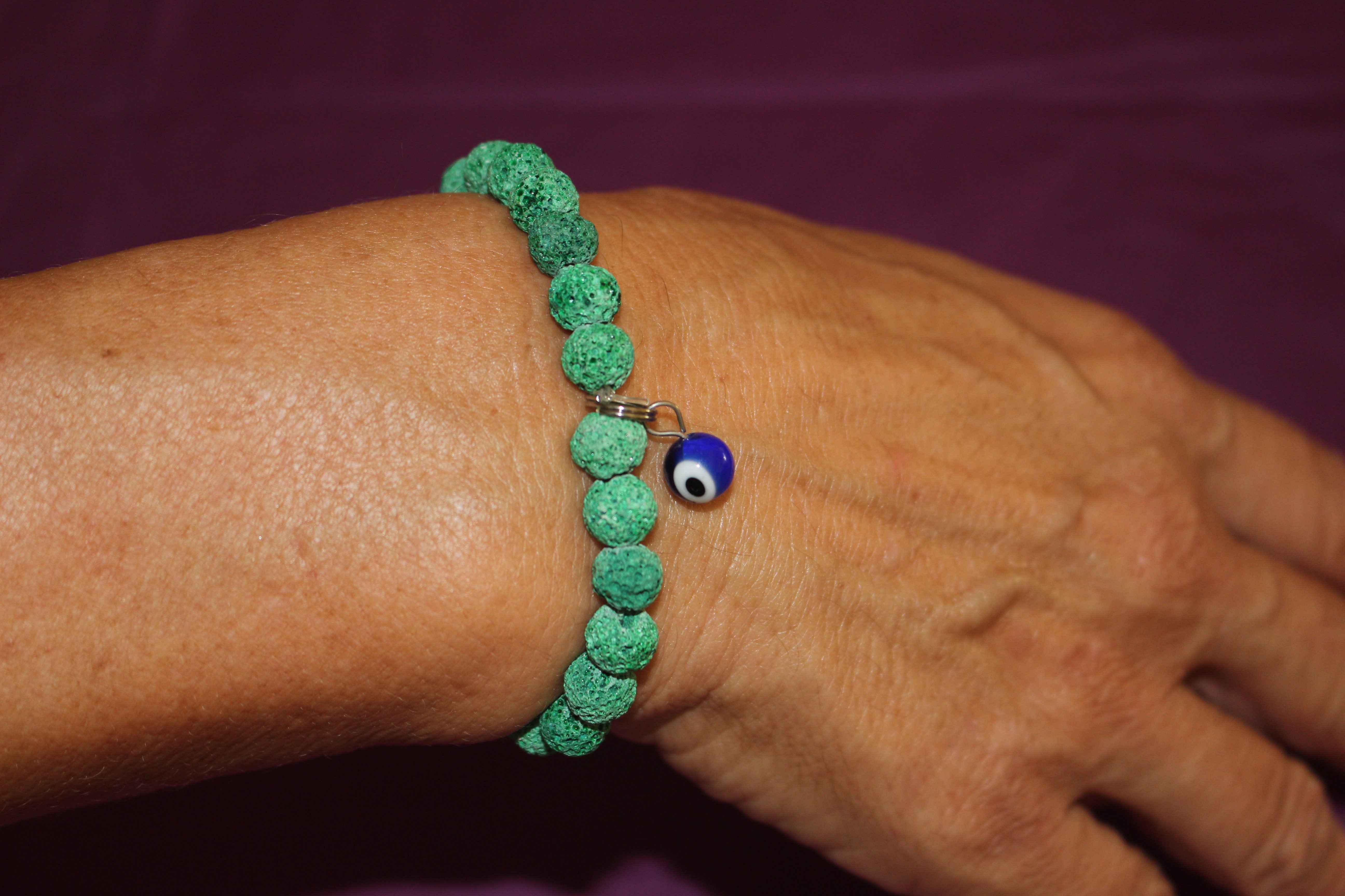 Pulsera de Piedra Volcánica verde con ojo turco (transmutación de energías negativas)